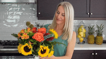 Lady arranging flowers