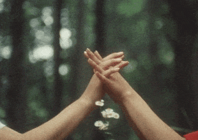 in love holding hands GIF