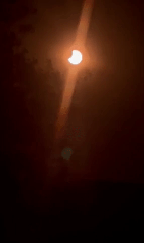 Partial Solar Eclipse Seen at Dusk in Santiago