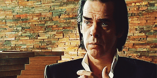 nick cave puppy prince of darkness GIF