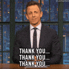 Late Night gif. Seth Meyers sits at his desk, hands folded and sincerely smiles and nods as he says, "Thank you...thank you...thank you..."