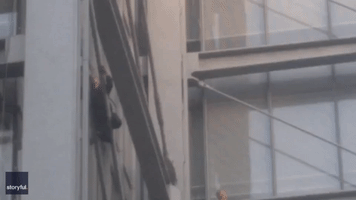 Police Rescue and Apprehend Man Who Climbed New York Times Building