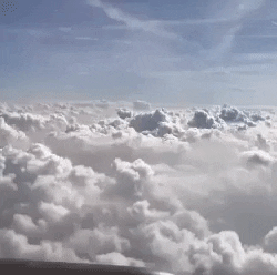 optik-koellner giphyupload clouds plane flight GIF