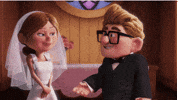 Disney gif. At their wedding in the movie Up, a young Ellie jumps and kisses Carl sweetly.
