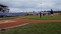 Centenarian Throws First Pitch at Baseball Game