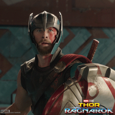 Movie gif. Slow zoom on a shocked Chris Hemsworth as Thor in a scene from Thor: Ragnarok. He shouts in excitement. Text, "Yes!!!"