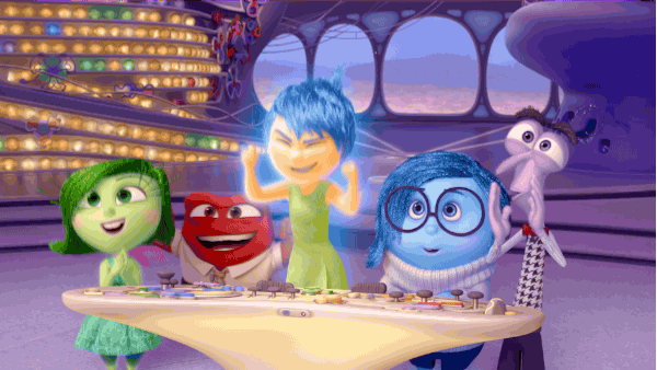 a scene from Pixar's Inside Out where all the characters are standing behind an architecture model and cheering and looking happy