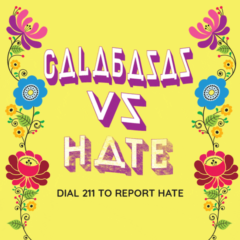 Text gif. Purple block letters ripple on a yellow background framed by 60s flower power folk art. Text, "Calabasas vs hate, Dial 211 to report hate."