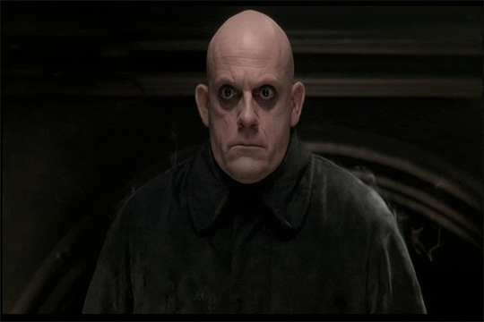 serious the addams family GIF