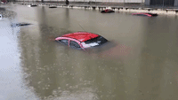 Cars Submerged at Bilbao Underpass Amid Severe Flooding