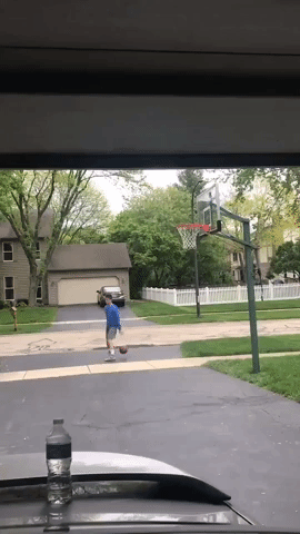 Illinois Postal Worker Provides Cheering Section for Teen Playing Basketball