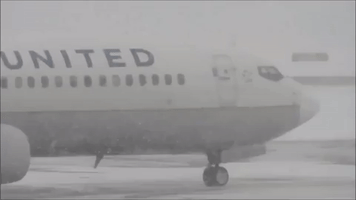 Lake-Effect Snow Creates Wintry Takeoff Scenes at Rochester Airport
