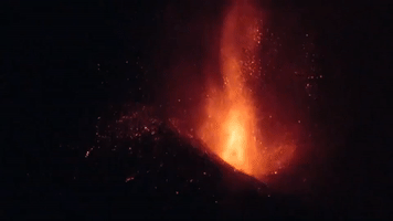 Lava Erupts From La Palma Volcano Into Night Sky