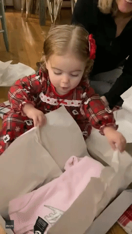 'Oh Goodness': Toddler Has Adorable Reactions While Opening Christmas Presents