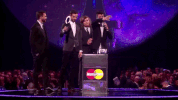 dan waving GIF by BRIT Awards
