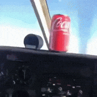 Flying Coca Cola GIF