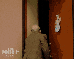 Spying Open Door GIF by Madman Films