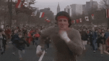 Movie gif. Sylvester Stallone as Rocky Balboa in Rocky runs down the middle of the road in a full sprint. A crowd of hundreds of people run behind him.




inFlux English School: O que significa "Never Mind" em inglês?