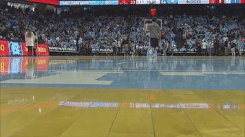 Young Boy Sinks Three Half-Court Shots in a Row During Halftime Show