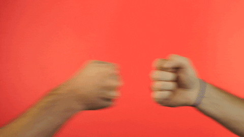 Video gif. Close-up on two people’s hands as they fist bump and then separate from another to reveal the text, “Great job!”