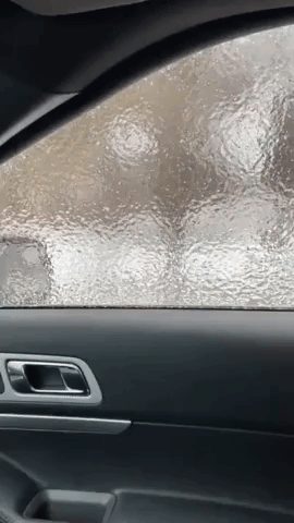 Sheet of Ice Freezes Over Car Window as Arctic Air Mass Moves Into New York