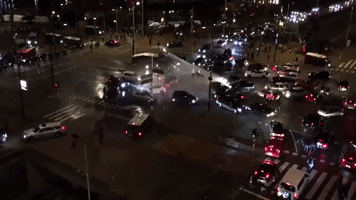 Protesters Disperse as Dutch Police Fire Water Cannon Into Crowds