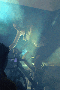 munbaik_cycling concert performance cycling event GIF