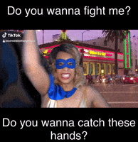 ComedianHollyLogan mask superhero fighting costume GIF