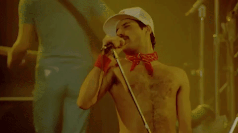performing freddie mercury GIF
