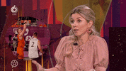 Sports gif. Anouk Hoogendijk shrugs with her hands out to the side as she speaks with wide eyes.
