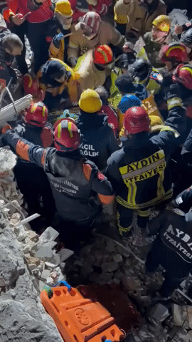 International Rescue Teams Work Together to Save Mother and Son From Rubble in Turkey