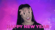 Video gif. A woman wearing glasses that read "2020!" dances and waves her arm excitedly in the air as fireworks explode behind her against a colorful blue and purple background. Text, "Happy New Year"