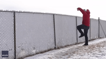 Canadian Weather Journalist Karate Kicks Snow Clad Fences in Calgary