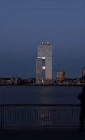 Pink Supermoon Caught Setting Behind Brooklyn Tower