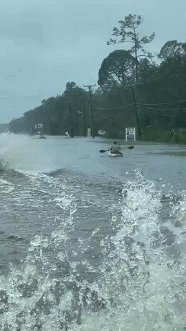 Man Kayaks Through Tropical Storm Ian Floodwater in Florida
