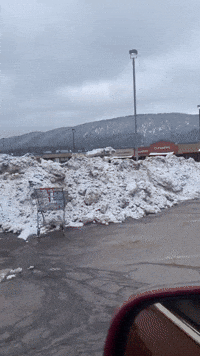Mounds of Leftover Snow Pile Up in Colorado Parking Lot