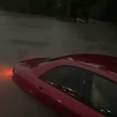 Cars Submerged by Floodwater as State of Emergency Declared in Lafayette, Louisiana