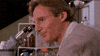 Movie gif. Liam Neeson as Peyton Westlake in Darkman turns away from a microscope with a distant and confused expression on his face. He says, “why? Why? Why? Why?”