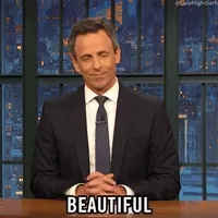 Late Night gif. Seth as host shakes his head disapprovingly, then looks a bit more receptive as he nods. He speaks. Text, 