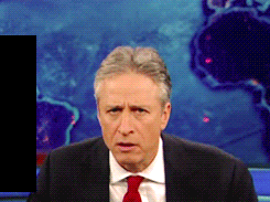 TV gif. Jon Stewart on The Daily Show shrinks back in exaggerated alarm, looking around in disbelief.