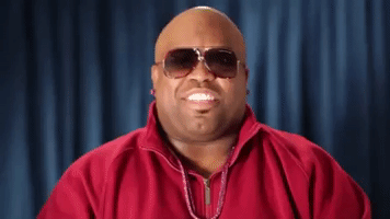 Celebrity gif. Ceelo Green is wearing sunglasses and chuckles and nods slowly as he says, "That's cool."