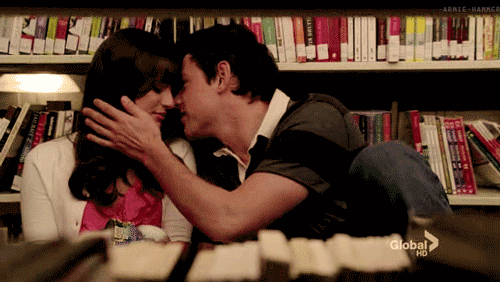 kiss couple kissing romantic library GIF