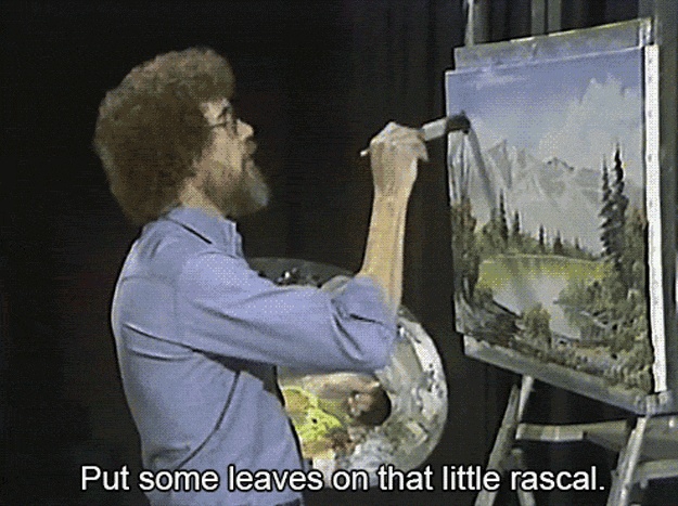 Bob ross painting some leaves on a tree