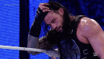 roman reigns wrestling GIF by WWE