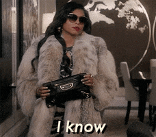 TV gif. Taraji P. Henson as Cookie on Empire, wearing an enormous fur coat and sunglasses, holding an expensive-looking purse, says, "I know," which appears as text.