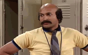 TV gif. Keegan-Michael Key as Coach Hines on Mad TV stands in a locker room with his hands on his hips, chewing gum rapidly, shaking his head, and blinking intensely.