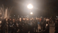 Late-Night Revelers Defy Curfew in New York City's Washington Square Park