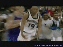 Sports gif. NBA player Kevin Martin celebrates a win, lowering his hands in a cupping motion, to indicate that he has big balls.