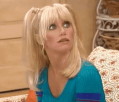 TV gif. Suzanne Somers as Chrissy in Three's Company nods her head with a smile as if in agreement then her smile fades with a look of confusion. Text, "How?" 