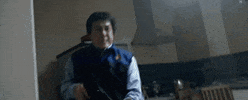 locked and loaded jackie chan GIF